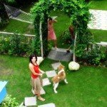 Walking a dog in the back lawn
